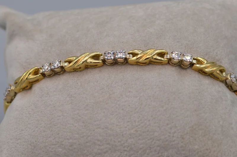 Wedding Bracelets for Brides-14K yellow gold and diamond bracelet - Hugs & Kisses design