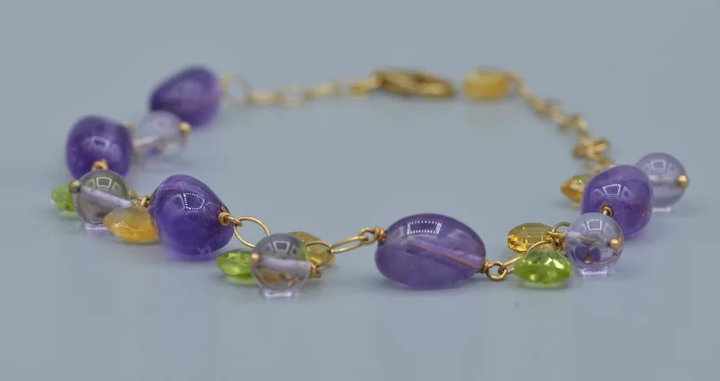 Gemstone Wrap Bracelets-14K yellow gold 7" bracelet with Amethyst, Peridot and Citrine dangles from the gold links